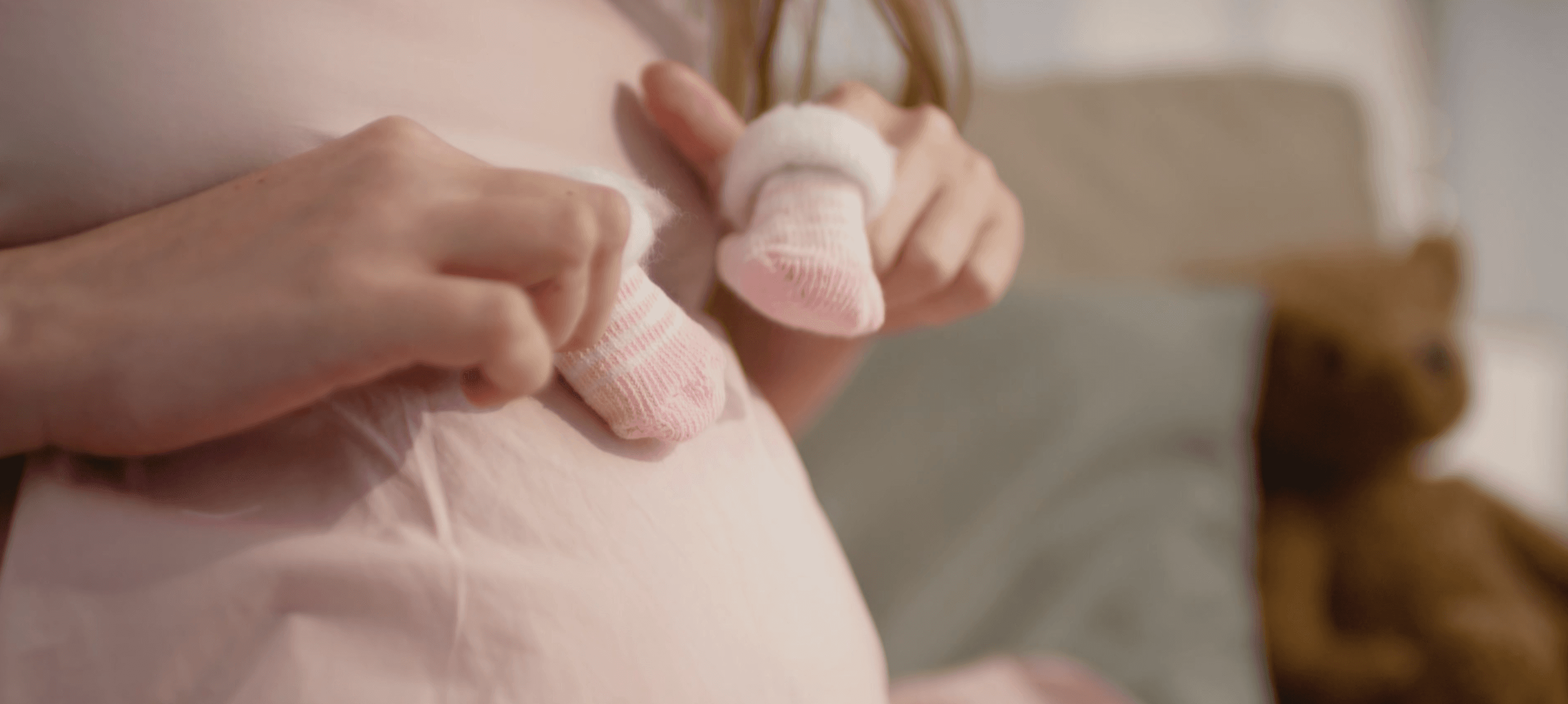 Happy mother holding her baby
